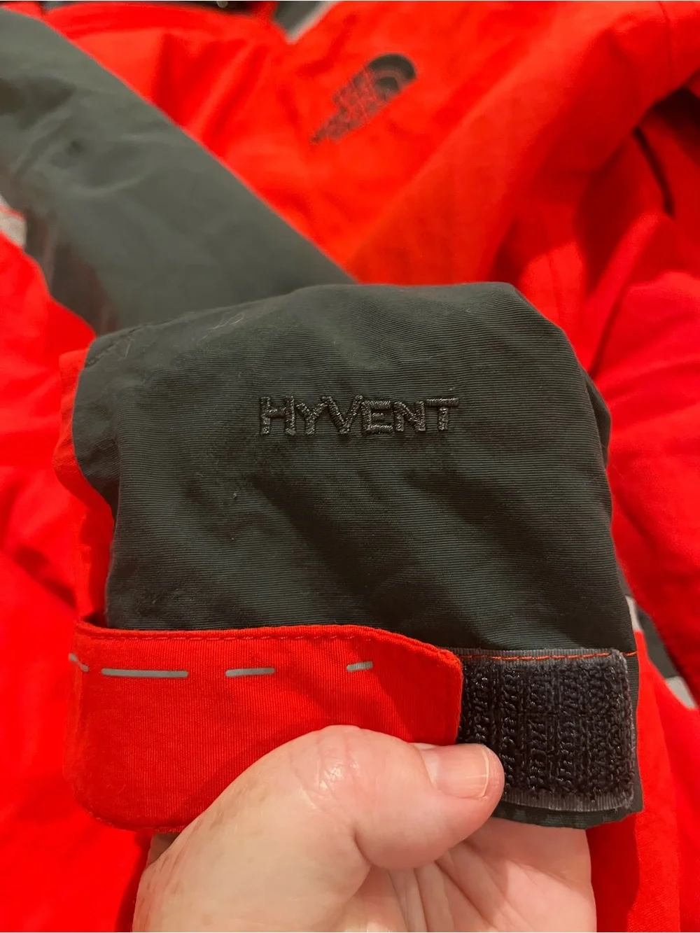 The North Face Red and Black Hooded Outdoor Jacket